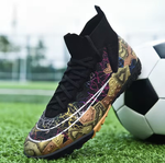 Tempesta Men’s Firm Ground Football Boots in black with gold sole and colourful crack details shown on a football pitch next to a ball