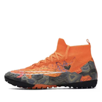 Tempesta Men’s Turf Football Boots in orange with black graphic design displayed on a clean white background