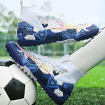 Tempesta Men’s Turf Football Boots in white with blue graphic details worn on artificial grass field with a football in the background
