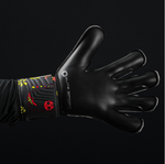 Close up of Elite Sport Pro Calavera goalkeeper glove palm in black latex with wrist support on black background
