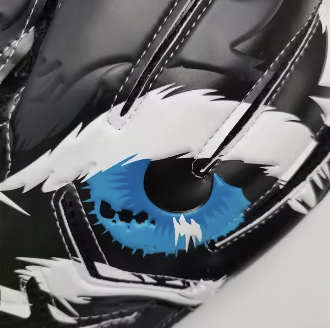 Close up of the blue eye graphic design on the back of a Men's Hunter Goalkeeper Glove on a white background.
