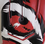 Close up of the blue eye graphic design on the red of a Men's Hunter Goalkeeper Glove on a white background.